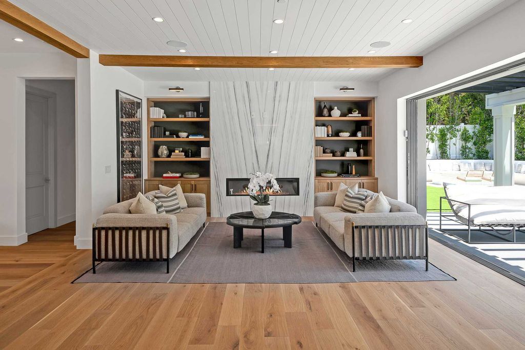 The Farmhouse in Los Angeles is a newly constructed modern property with sweeping views of the iconic Hollywood Sign now available for sale. This home located at 6310 Mirror Lake Dr, Los Angeles, California