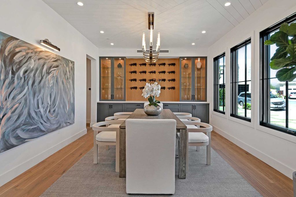 The Farmhouse in Los Angeles is a newly constructed modern property with sweeping views of the iconic Hollywood Sign now available for sale. This home located at 6310 Mirror Lake Dr, Los Angeles, California