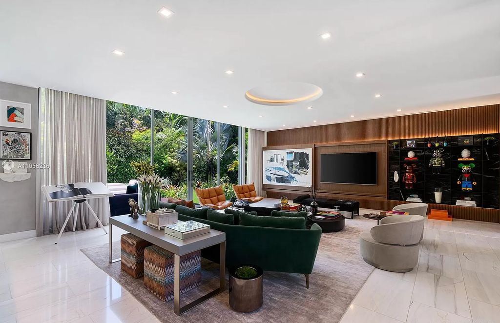 The Home in Miami Beach is a newly built tropical modern property has luxurious living space flawlessly connecting with the exterior now available for sale. This home located at 4535 Nautilus Ct, Miami Beach, Florida