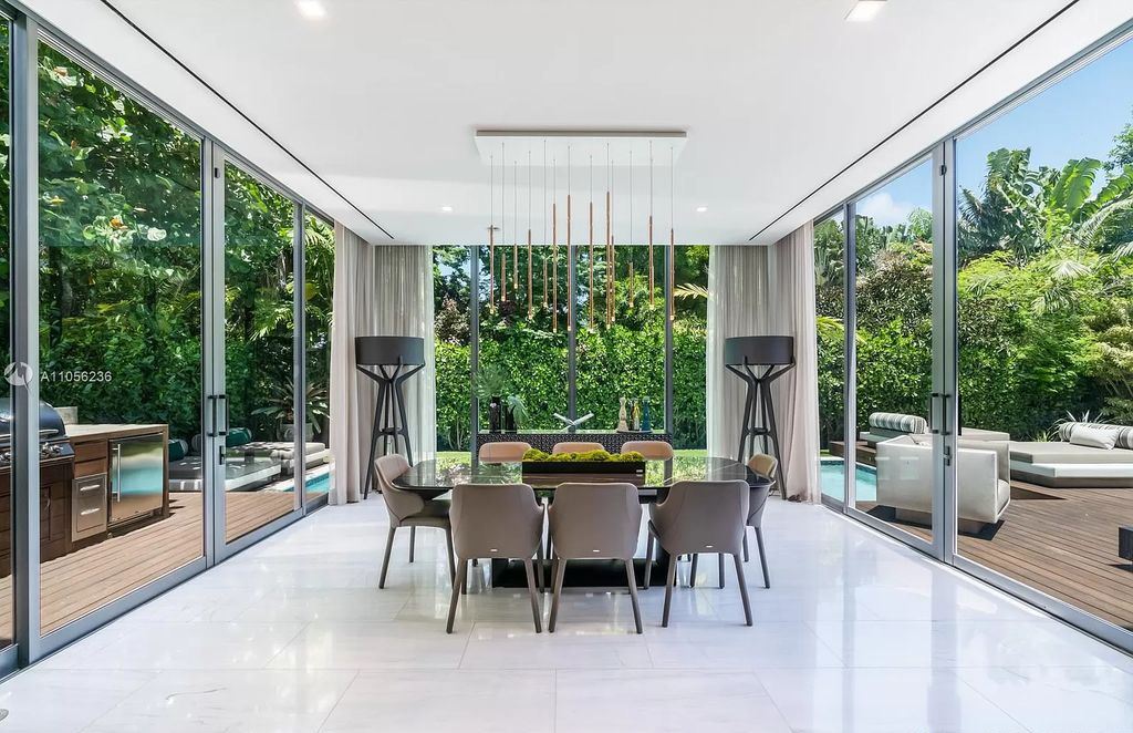 The Home in Miami Beach is a newly built tropical modern property has luxurious living space flawlessly connecting with the exterior now available for sale. This home located at 4535 Nautilus Ct, Miami Beach, Florida