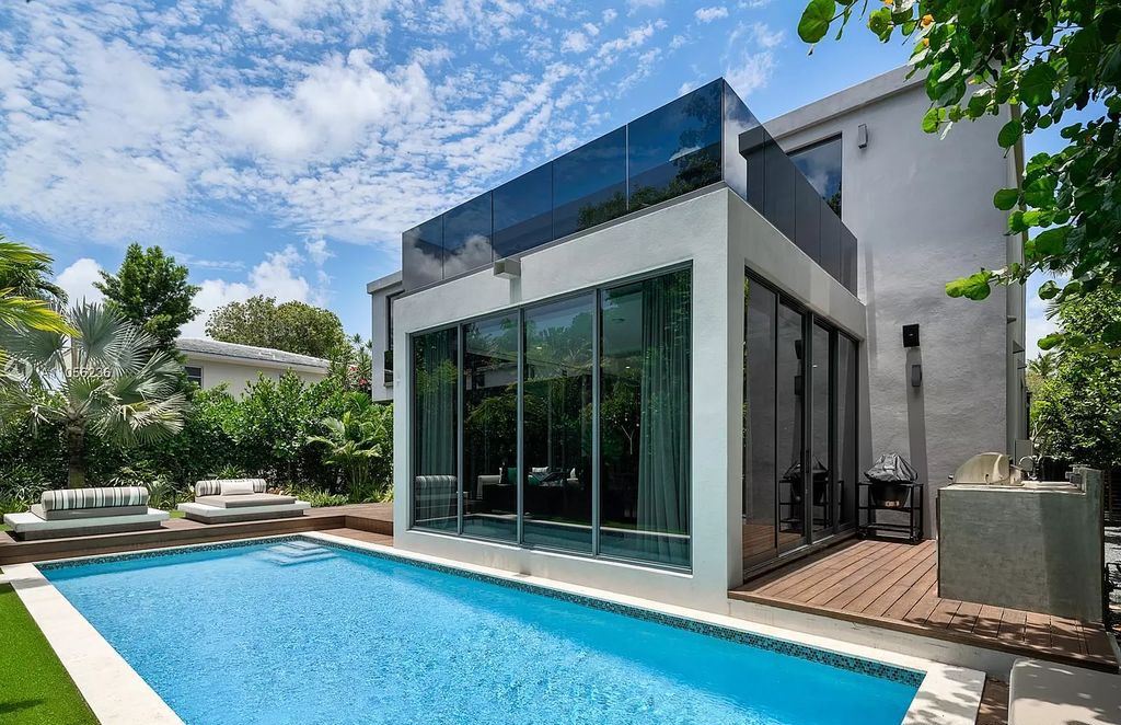 The Home in Miami Beach is a newly built tropical modern property has luxurious living space flawlessly connecting with the exterior now available for sale. This home located at 4535 Nautilus Ct, Miami Beach, Florida