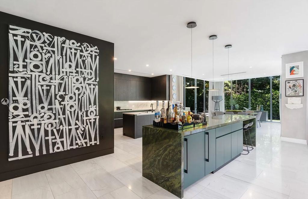 The Home in Miami Beach is a newly built tropical modern property has luxurious living space flawlessly connecting with the exterior now available for sale. This home located at 4535 Nautilus Ct, Miami Beach, Florida