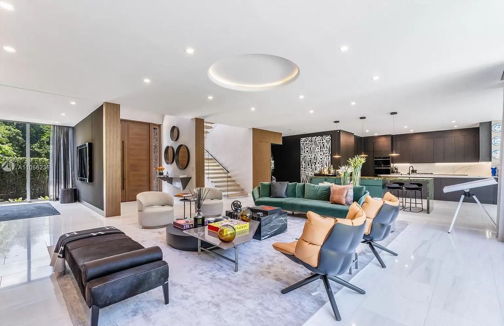 The Home in Miami Beach is a newly built tropical modern property has luxurious living space flawlessly connecting with the exterior now available for sale. This home located at 4535 Nautilus Ct, Miami Beach, Florida