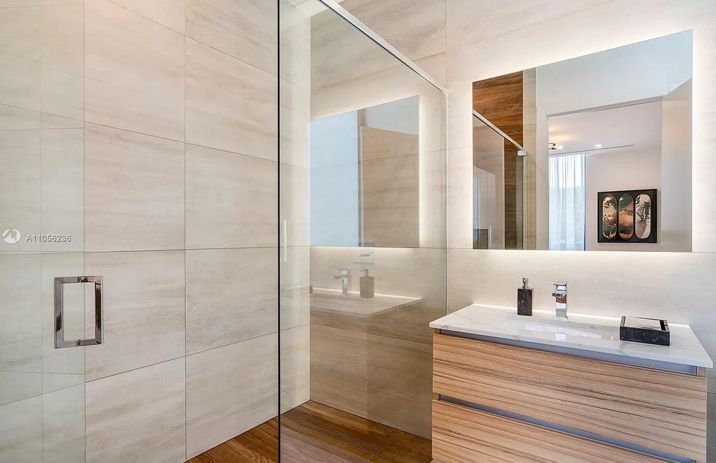 The Home in Miami Beach is a newly built tropical modern property has luxurious living space flawlessly connecting with the exterior now available for sale. This home located at 4535 Nautilus Ct, Miami Beach, Florida