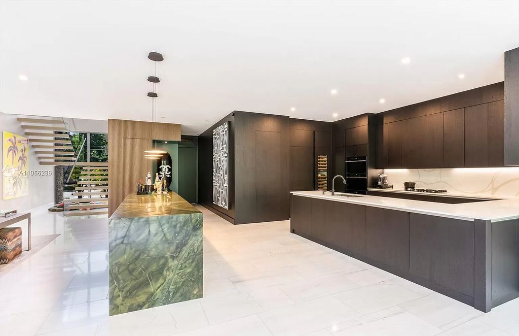The Home in Miami Beach is a newly built tropical modern property has luxurious living space flawlessly connecting with the exterior now available for sale. This home located at 4535 Nautilus Ct, Miami Beach, Florida