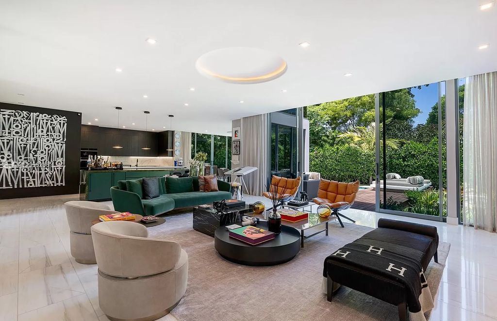The Home in Miami Beach is a newly built tropical modern property has luxurious living space flawlessly connecting with the exterior now available for sale. This home located at 4535 Nautilus Ct, Miami Beach, Florida