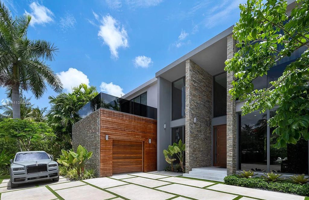 The Home in Miami Beach is a newly built tropical modern property has luxurious living space flawlessly connecting with the exterior now available for sale. This home located at 4535 Nautilus Ct, Miami Beach, Florida