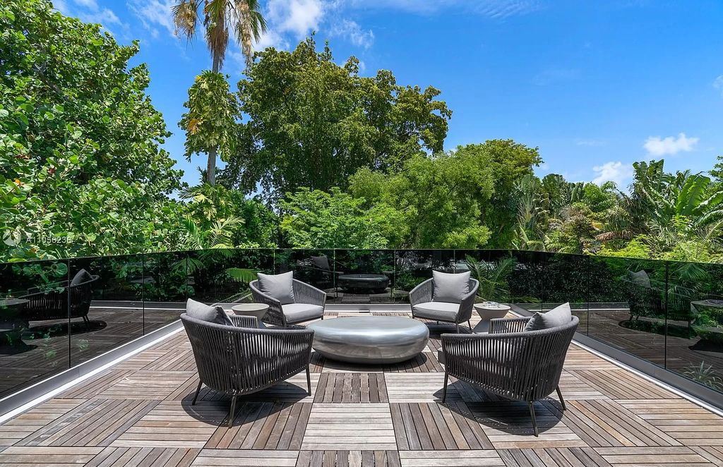 The Home in Miami Beach is a newly built tropical modern property has luxurious living space flawlessly connecting with the exterior now available for sale. This home located at 4535 Nautilus Ct, Miami Beach, Florida