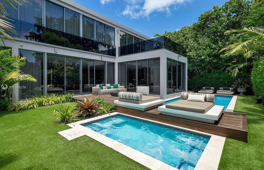 The Home in Miami Beach is a newly built tropical modern property has luxurious living space flawlessly connecting with the exterior now available for sale. This home located at 4535 Nautilus Ct, Miami Beach, Florida