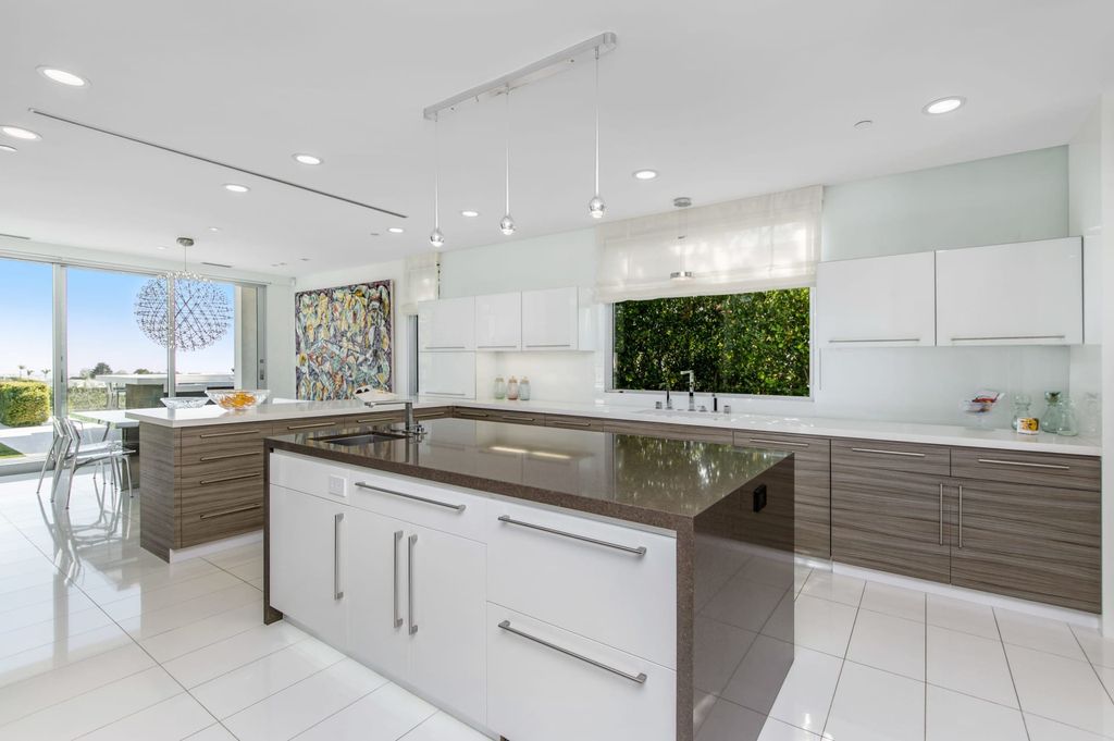 The Mid-century Contemporary Home in Beverly Hills situated on a prime city view rim lot in prestigious Trousdale Estates now available for sale. This home located at 1790 Carla Rdg, Beverly Hills, California