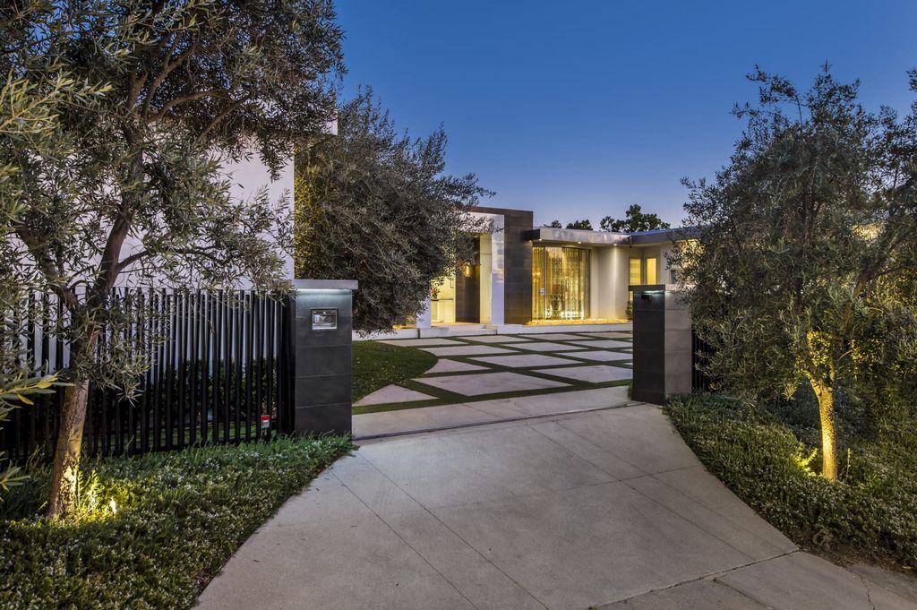 The Mid-century Contemporary Home in Beverly Hills situated on a prime city view rim lot in prestigious Trousdale Estates now available for sale. This home located at 1790 Carla Rdg, Beverly Hills, California
