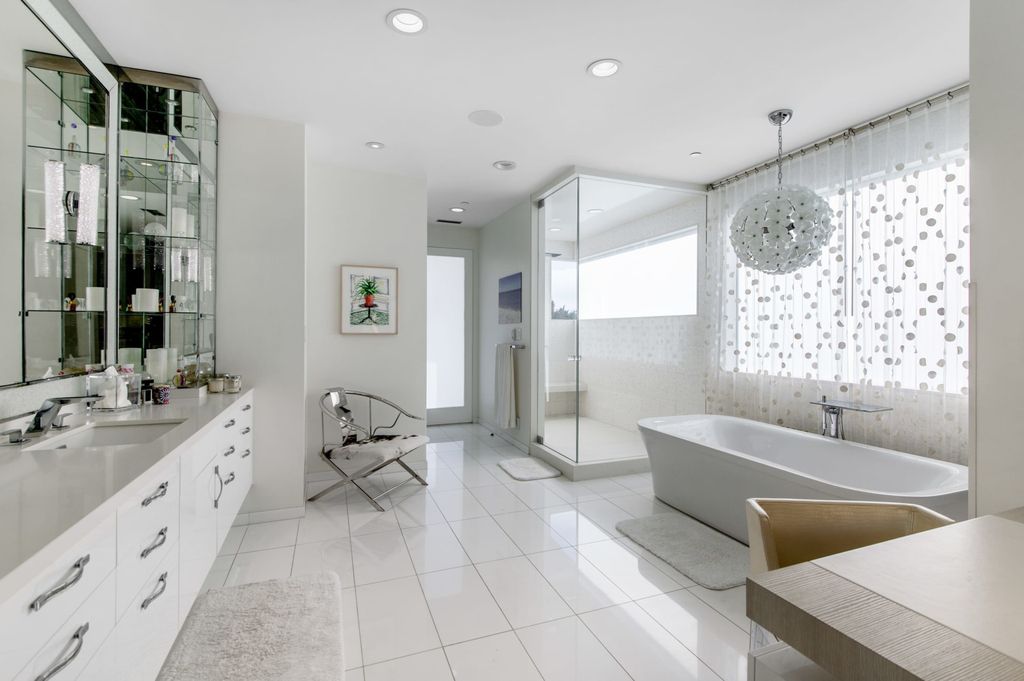 The Mid-century Contemporary Home in Beverly Hills situated on a prime city view rim lot in prestigious Trousdale Estates now available for sale. This home located at 1790 Carla Rdg, Beverly Hills, California