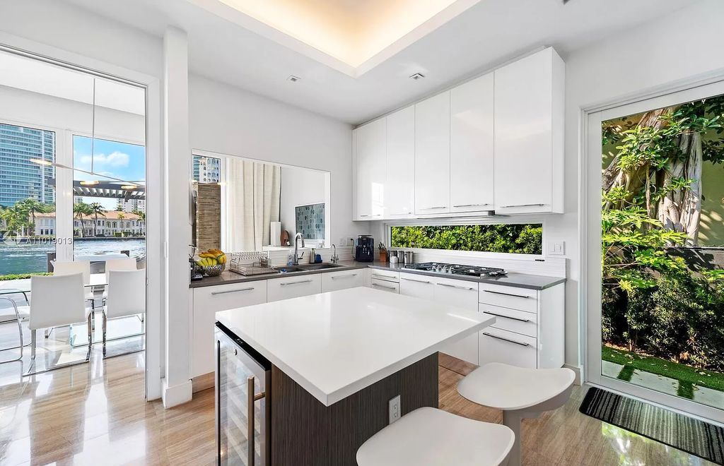 The Home in Golden Beach is a newly renovated custom masterpiece offers unmatched amenities in the premier South Island now available for sale. This home located at 224 S Is, North Miami Beach, Florida