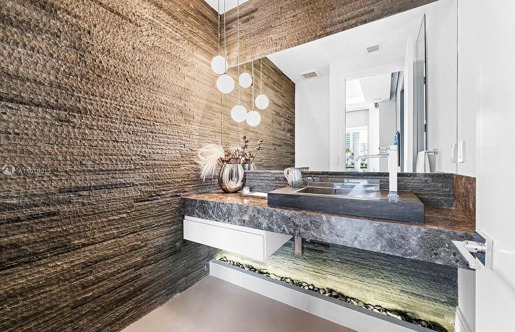 The Home in Golden Beach is a newly renovated custom masterpiece offers unmatched amenities in the premier South Island now available for sale. This home located at 224 S Is, North Miami Beach, Florida