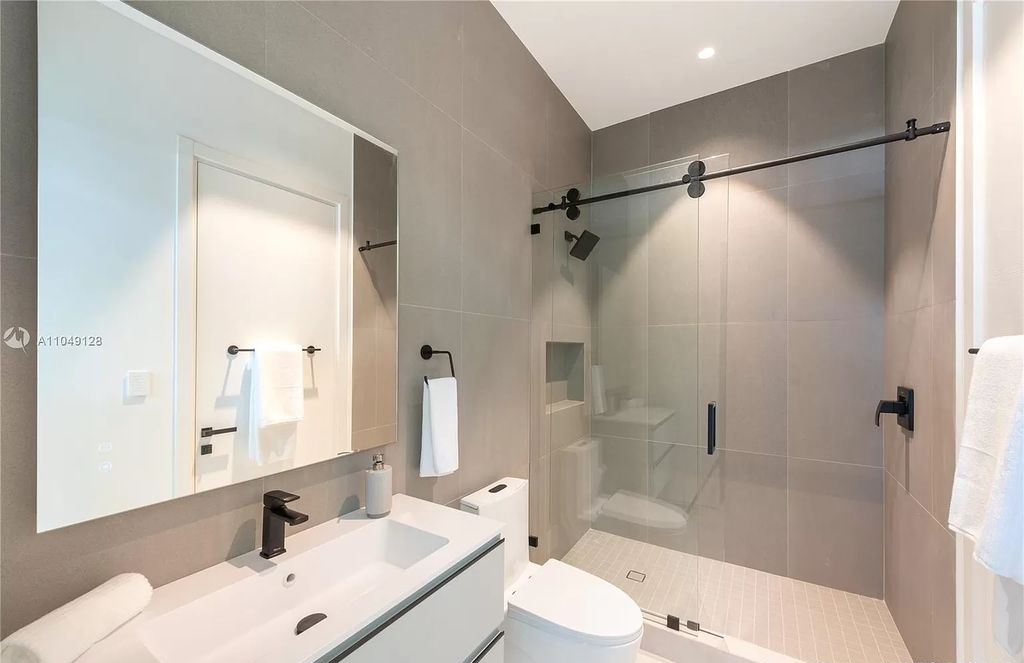 The Modern Home in Miami Beach is a Spectacular new construction located on exclusive Hibiscus Island in South Beach now available for sale. This home located at 118 W 4th Ct, Miami Beach, Florida