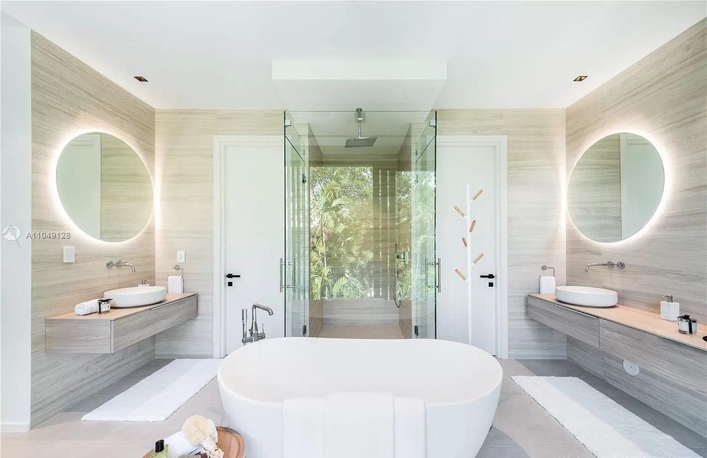 The Modern Home in Miami Beach is a Spectacular new construction located on exclusive Hibiscus Island in South Beach now available for sale. This home located at 118 W 4th Ct, Miami Beach, Florida