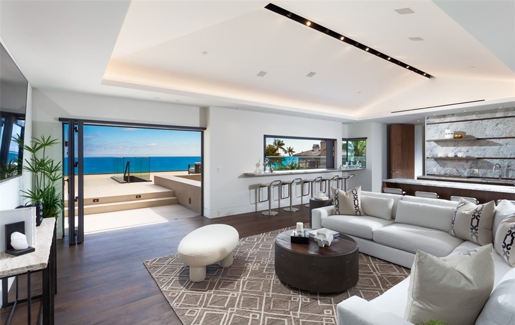 The Mansion in Laguna Beach is a newly reimagined and reconstructed Legacy estate with unparalleled views of the Pacific Ocean’s sparkling waters now available for sale. This home located at 33 Smithcliffs Rd, Laguna Beach, California;