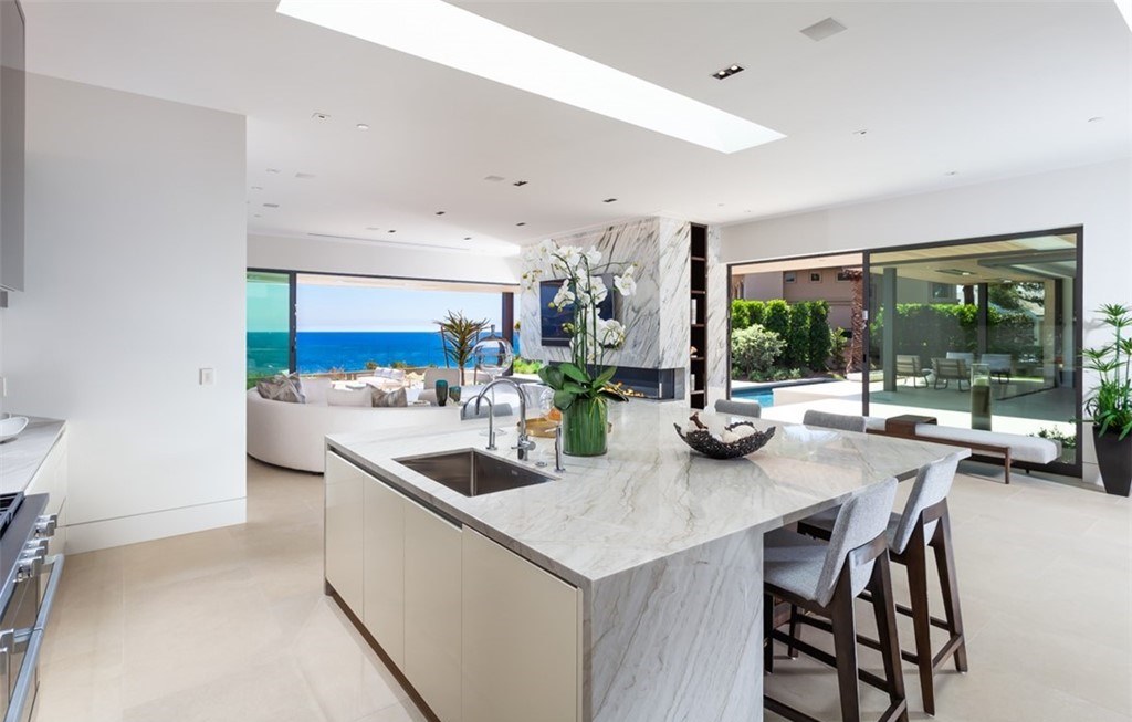 The Mansion in Laguna Beach is a newly reimagined and reconstructed Legacy estate with unparalleled views of the Pacific Ocean’s sparkling waters now available for sale. This home located at 33 Smithcliffs Rd, Laguna Beach, California;