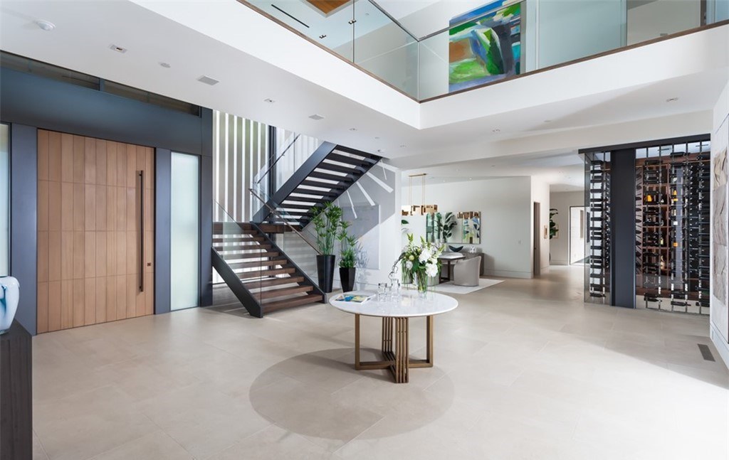 The Mansion in Laguna Beach is a newly reimagined and reconstructed Legacy estate with unparalleled views of the Pacific Ocean’s sparkling waters now available for sale. This home located at 33 Smithcliffs Rd, Laguna Beach, California;