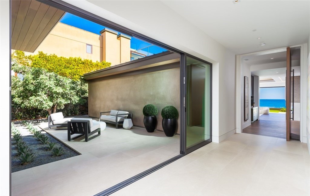 The Mansion in Laguna Beach is a newly reimagined and reconstructed Legacy estate with unparalleled views of the Pacific Ocean’s sparkling waters now available for sale. This home located at 33 Smithcliffs Rd, Laguna Beach, California;