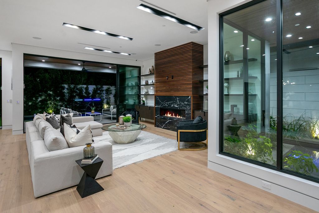The Los Angeles Home is exquisite new construction modern gem offers sweeping open floorplan with a grand entrance now available for sale. This home located at 729 N Kilkea Dr, Los Angeles, California