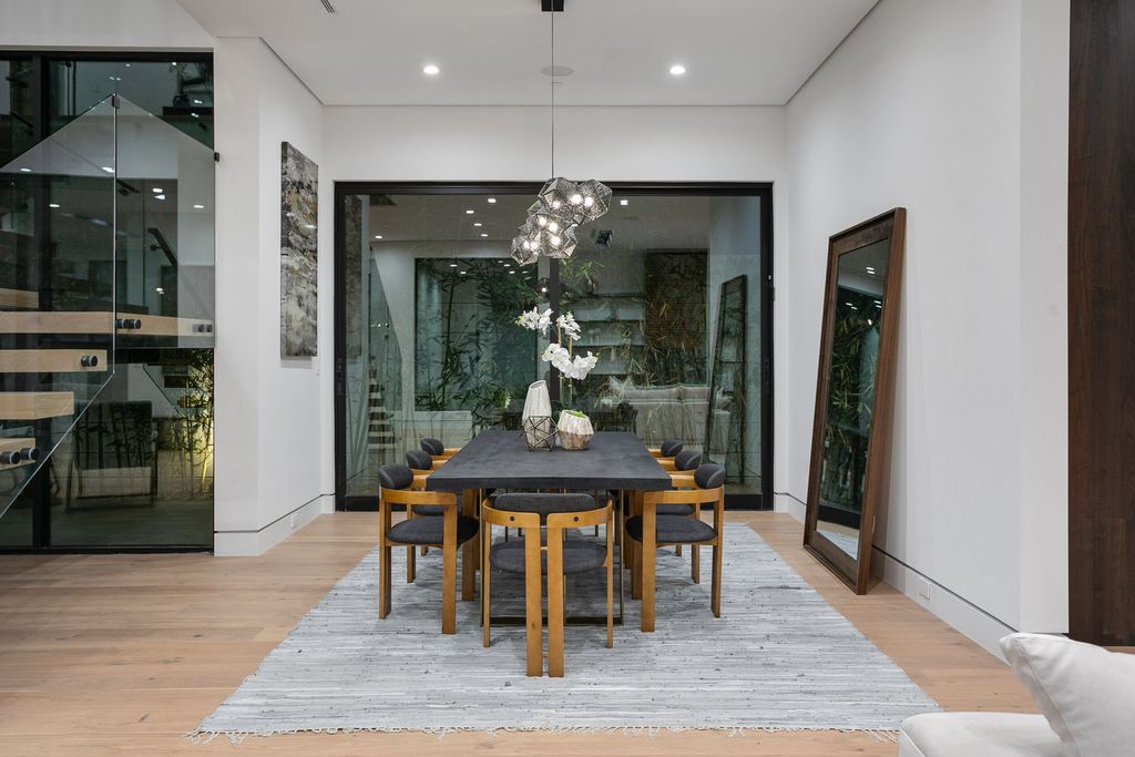 The Los Angeles Home is exquisite new construction modern gem offers sweeping open floorplan with a grand entrance now available for sale. This home located at 729 N Kilkea Dr, Los Angeles, California