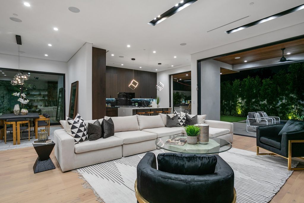The Los Angeles Home is exquisite new construction modern gem offers sweeping open floorplan with a grand entrance now available for sale. This home located at 729 N Kilkea Dr, Los Angeles, California