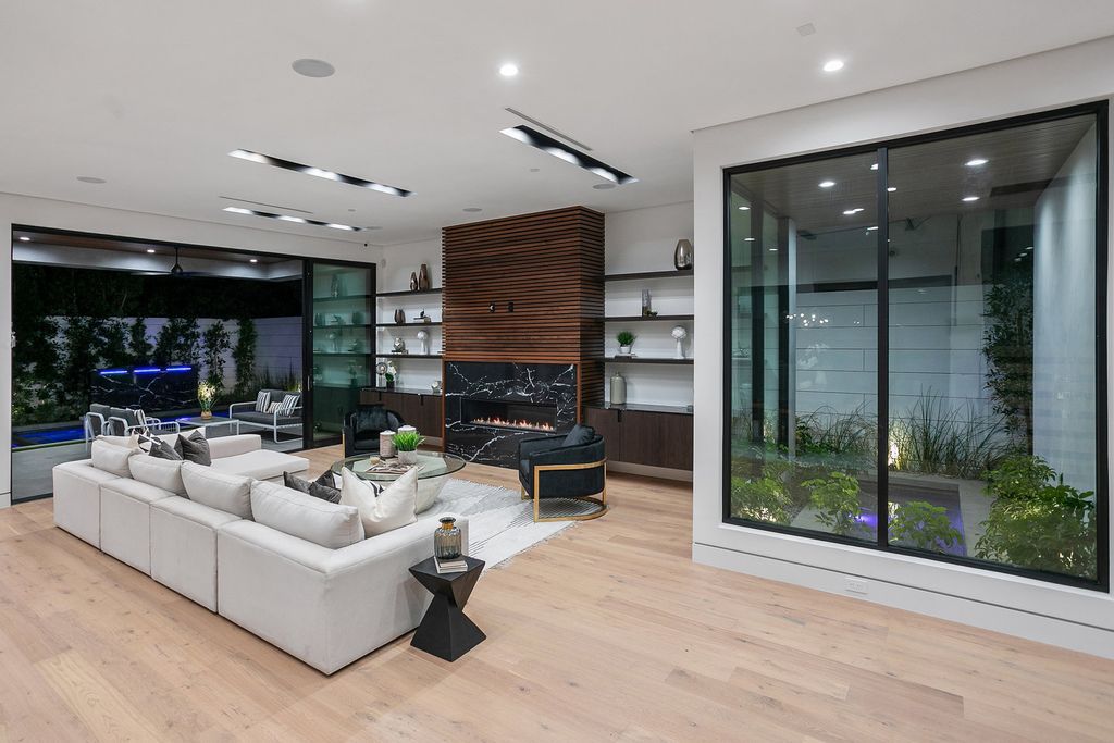 The Los Angeles Home is exquisite new construction modern gem offers sweeping open floorplan with a grand entrance now available for sale. This home located at 729 N Kilkea Dr, Los Angeles, California