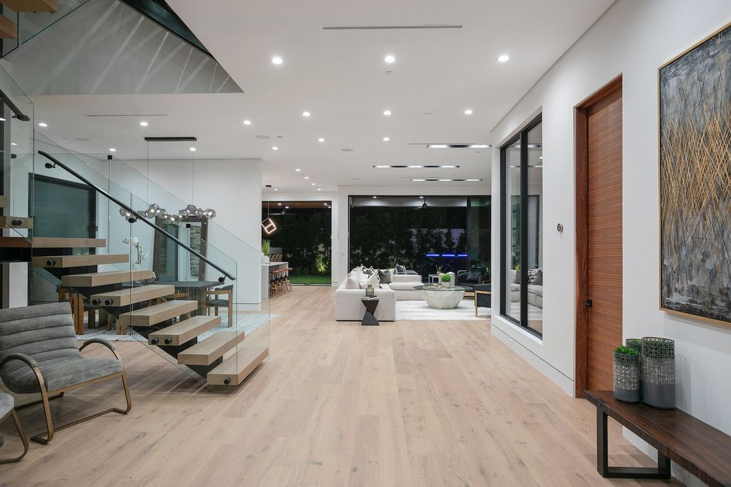The Los Angeles Home is exquisite new construction modern gem offers sweeping open floorplan with a grand entrance now available for sale. This home located at 729 N Kilkea Dr, Los Angeles, California
