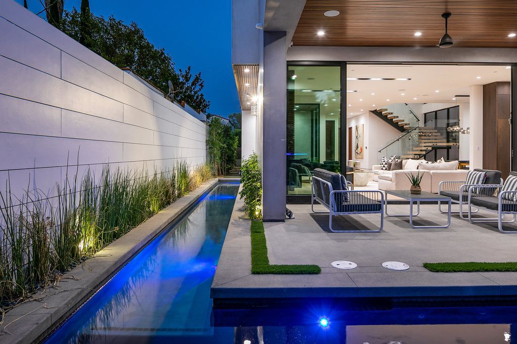 The Los Angeles Home is exquisite new construction modern gem offers sweeping open floorplan with a grand entrance now available for sale. This home located at 729 N Kilkea Dr, Los Angeles, California