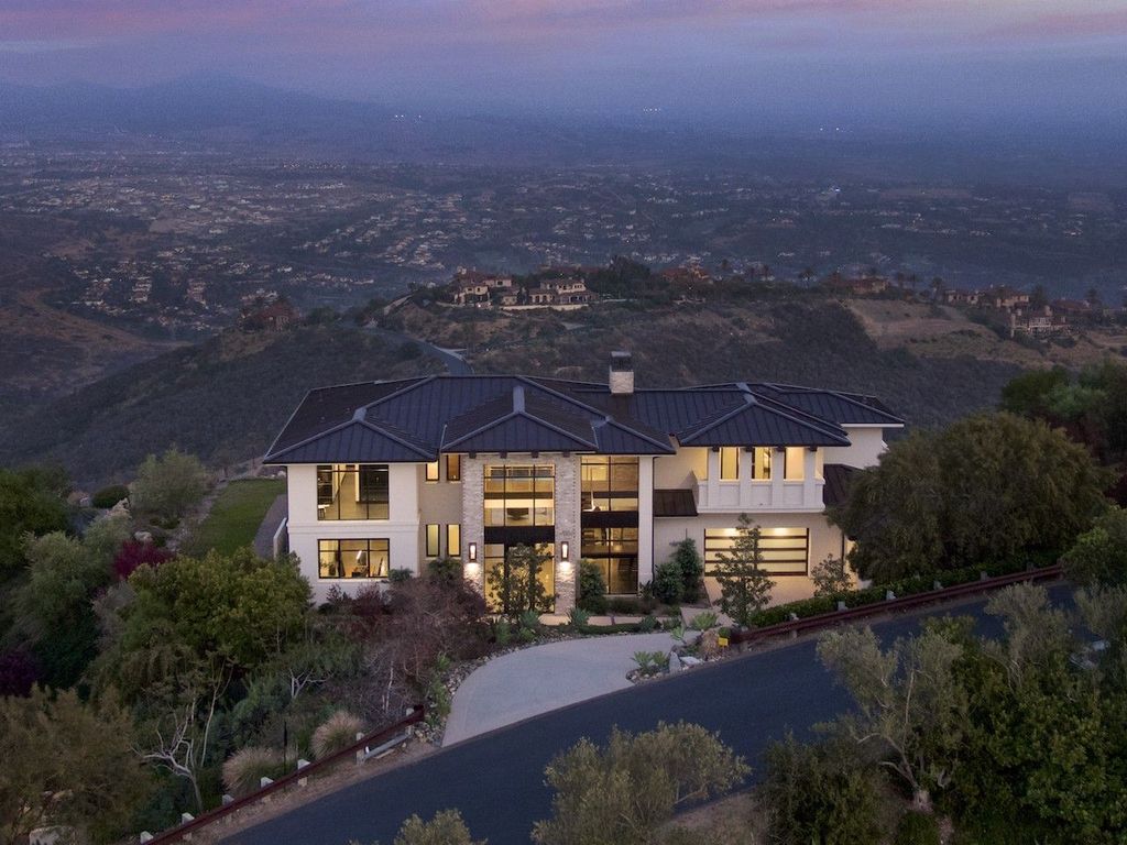 The Home in Rancho Santa Fe is a custom-built, two-story residence in the coveted Cielo community features breathtaking views now available for sale. This home located at 7923 Camino De Arriba, Rancho Santa Fe, California