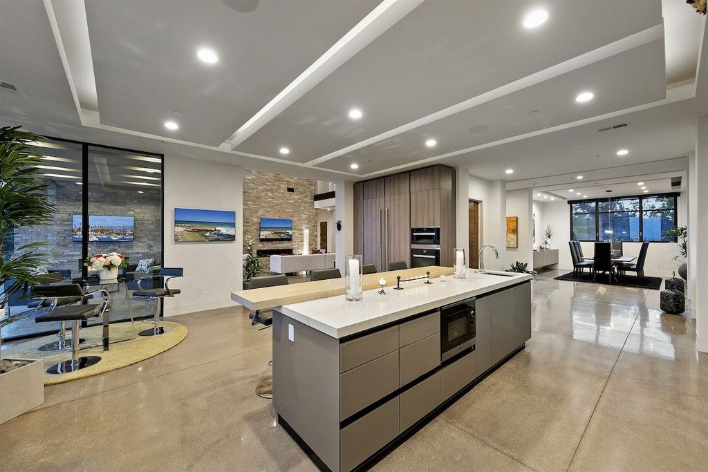 The Home in Rancho Santa Fe is a custom-built, two-story residence in the coveted Cielo community features breathtaking views now available for sale. This home located at 7923 Camino De Arriba, Rancho Santa Fe, California