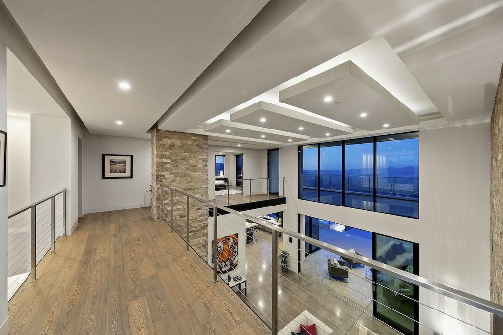 The Home in Rancho Santa Fe is a custom-built, two-story residence in the coveted Cielo community features breathtaking views now available for sale. This home located at 7923 Camino De Arriba, Rancho Santa Fe, California