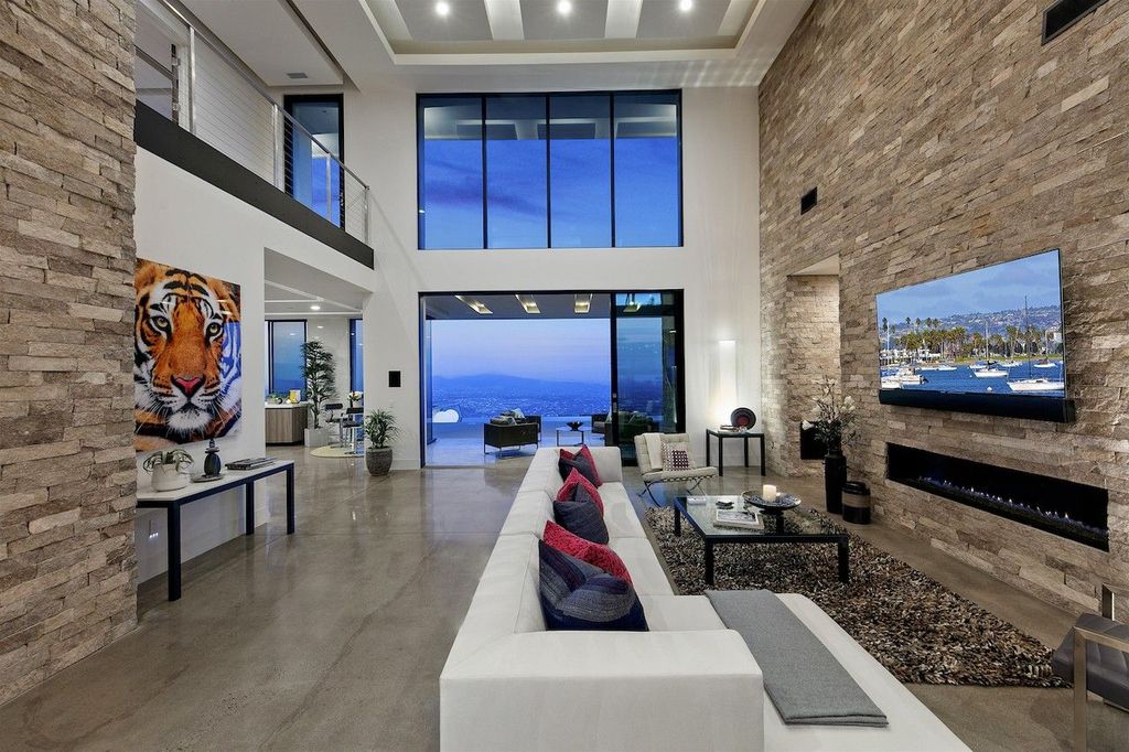 The Home in Rancho Santa Fe is a custom-built, two-story residence in the coveted Cielo community features breathtaking views now available for sale. This home located at 7923 Camino De Arriba, Rancho Santa Fe, California