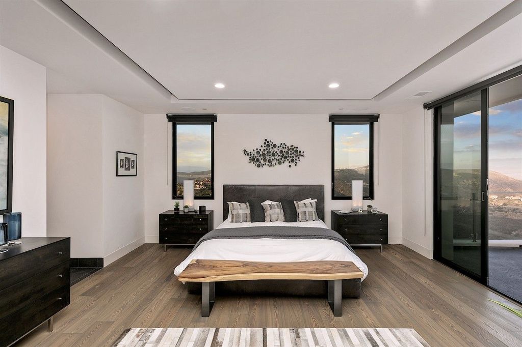 The Home in Rancho Santa Fe is a custom-built, two-story residence in the coveted Cielo community features breathtaking views now available for sale. This home located at 7923 Camino De Arriba, Rancho Santa Fe, California