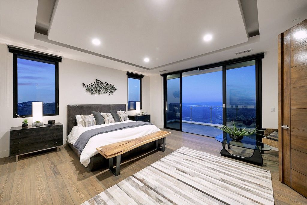 The Home in Rancho Santa Fe is a custom-built, two-story residence in the coveted Cielo community features breathtaking views now available for sale. This home located at 7923 Camino De Arriba, Rancho Santa Fe, California