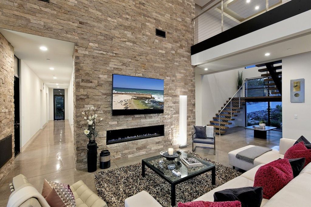 The Home in Rancho Santa Fe is a custom-built, two-story residence in the coveted Cielo community features breathtaking views now available for sale. This home located at 7923 Camino De Arriba, Rancho Santa Fe, California