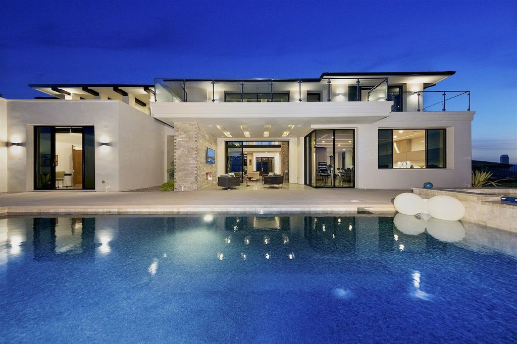 The Home in Rancho Santa Fe is a custom-built, two-story residence in the coveted Cielo community features breathtaking views now available for sale. This home located at 7923 Camino De Arriba, Rancho Santa Fe, California