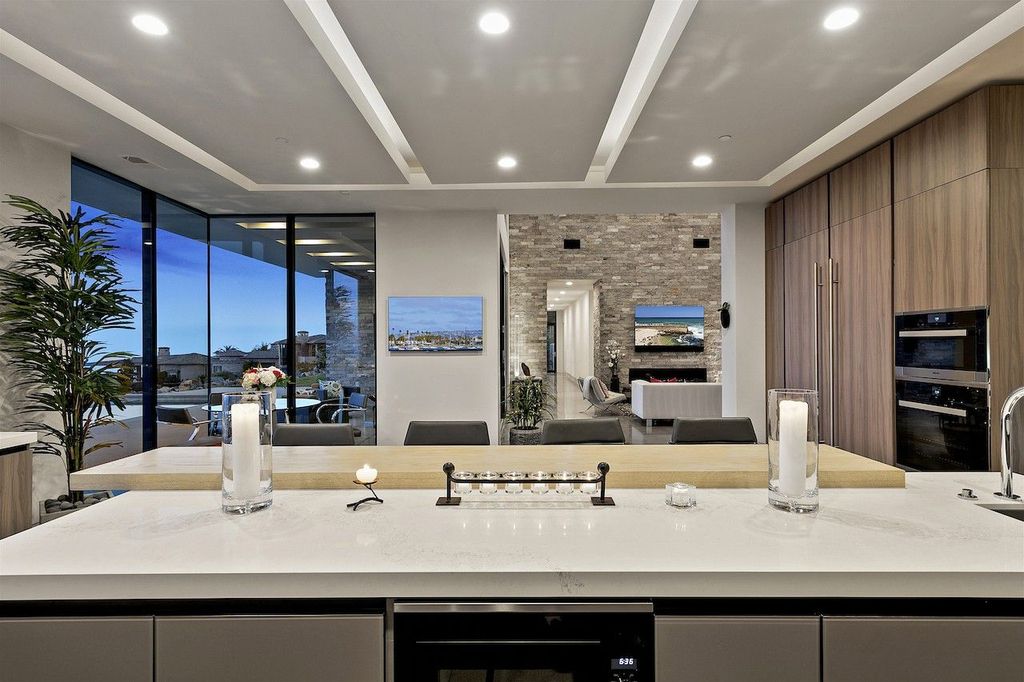 The Home in Rancho Santa Fe is a custom-built, two-story residence in the coveted Cielo community features breathtaking views now available for sale. This home located at 7923 Camino De Arriba, Rancho Santa Fe, California