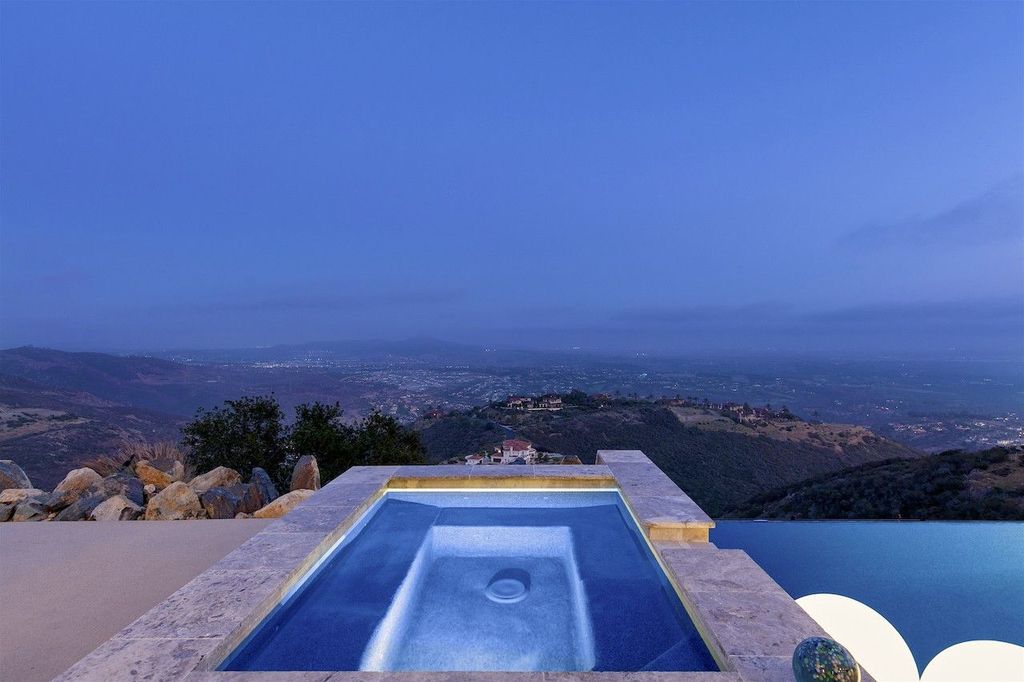The Home in Rancho Santa Fe is a custom-built, two-story residence in the coveted Cielo community features breathtaking views now available for sale. This home located at 7923 Camino De Arriba, Rancho Santa Fe, California
