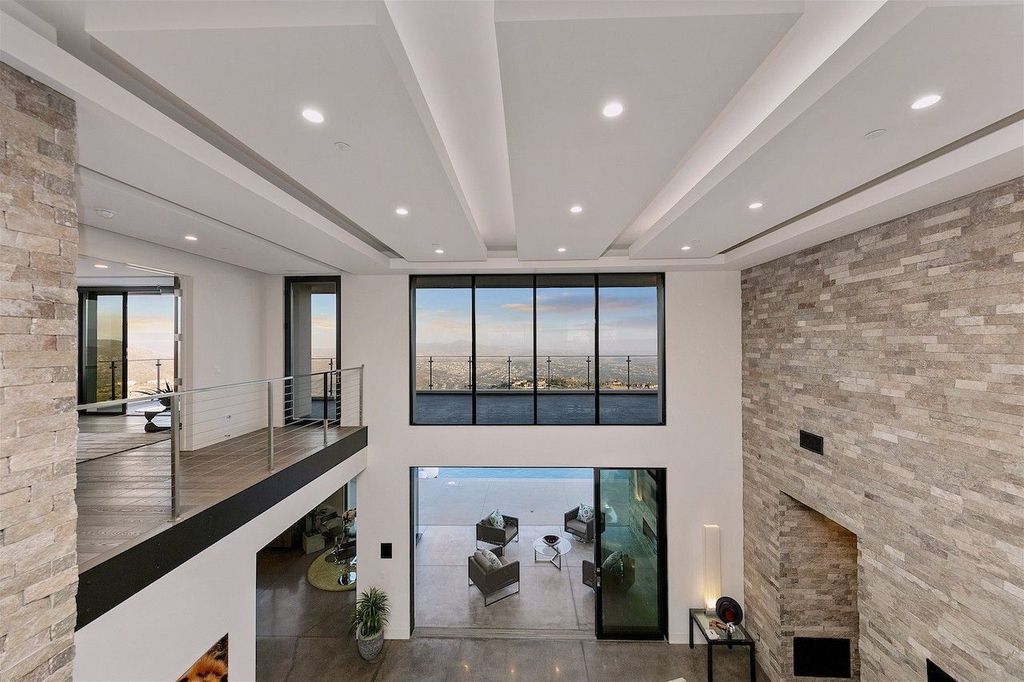 The Home in Rancho Santa Fe is a custom-built, two-story residence in the coveted Cielo community features breathtaking views now available for sale. This home located at 7923 Camino De Arriba, Rancho Santa Fe, California