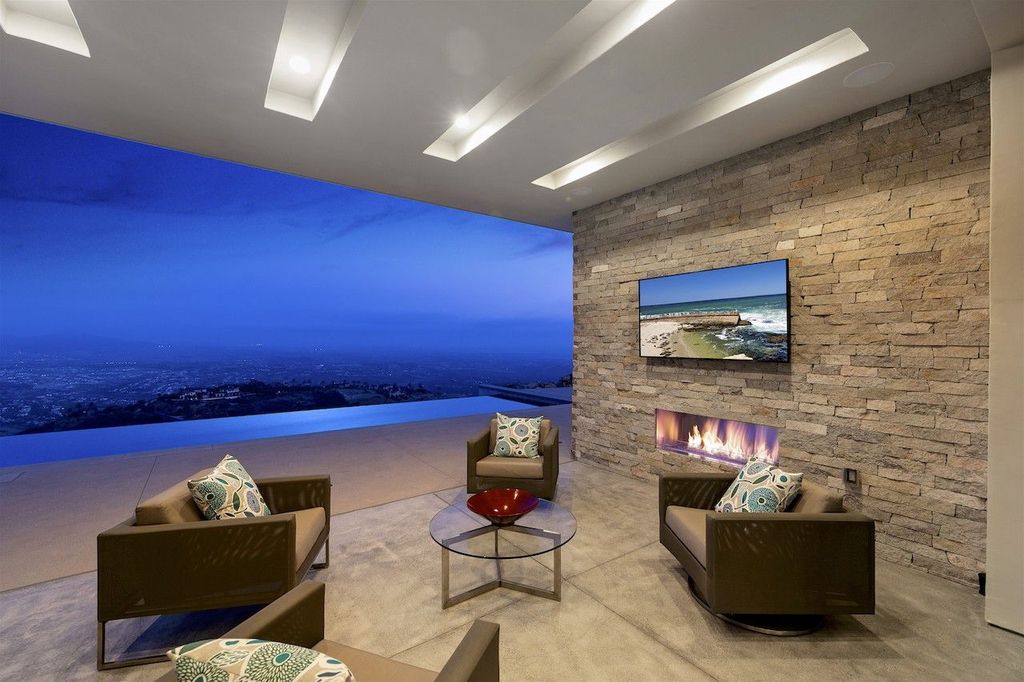 The Home in Rancho Santa Fe is a custom-built, two-story residence in the coveted Cielo community features breathtaking views now available for sale. This home located at 7923 Camino De Arriba, Rancho Santa Fe, California