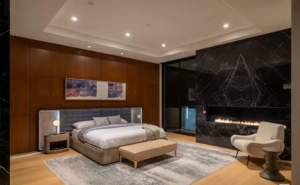 The Home in Hollywood Hills is a brand new contemporary masterpiece with unparalleled finishes and museum-quality materials now available for sale. This home located at 9410 Sierra Mar Pl, Los Angeles, California