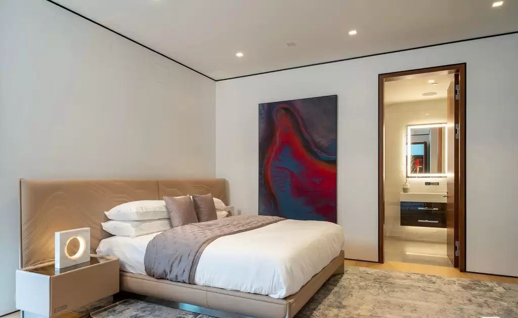 The Home in Hollywood Hills is a brand new contemporary masterpiece with unparalleled finishes and museum-quality materials now available for sale. This home located at 9410 Sierra Mar Pl, Los Angeles, California