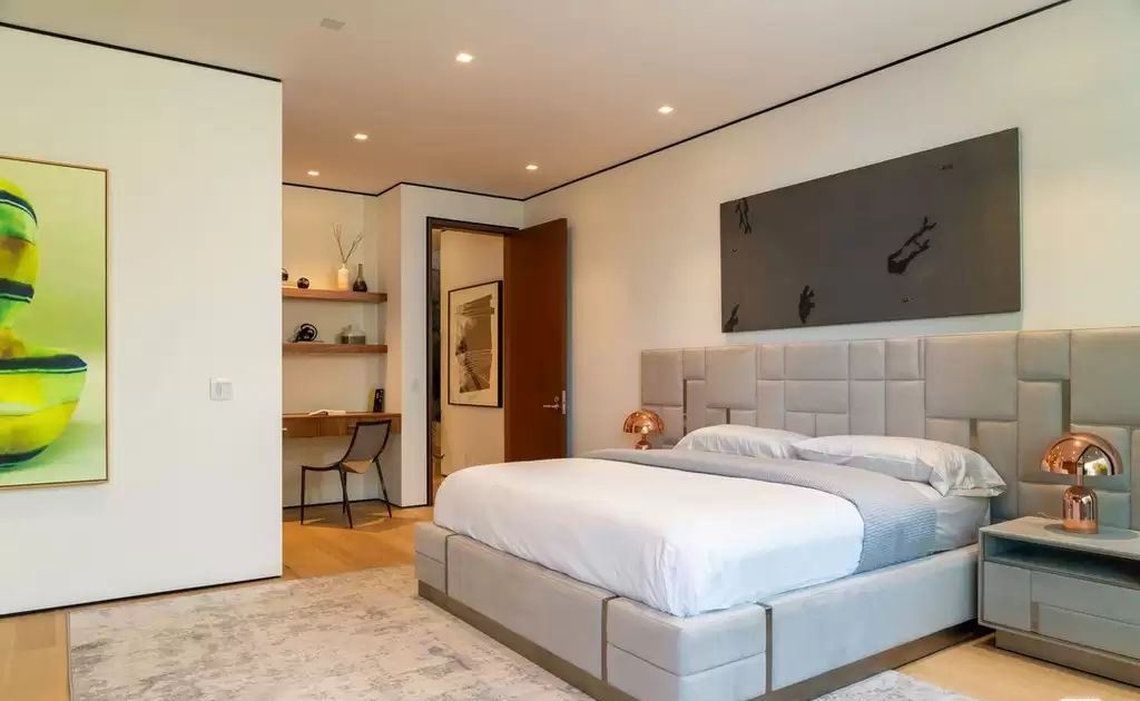 The Home in Hollywood Hills is a brand new contemporary masterpiece with unparalleled finishes and museum-quality materials now available for sale. This home located at 9410 Sierra Mar Pl, Los Angeles, California