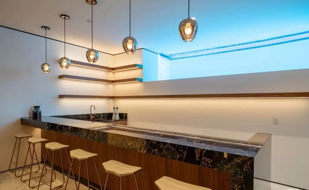 The Home in Hollywood Hills is a brand new contemporary masterpiece with unparalleled finishes and museum-quality materials now available for sale. This home located at 9410 Sierra Mar Pl, Los Angeles, California