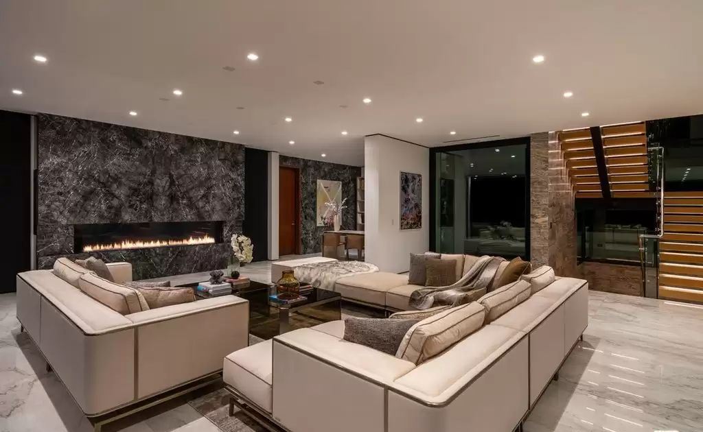 The Home in Hollywood Hills is a brand new contemporary masterpiece with unparalleled finishes and museum-quality materials now available for sale. This home located at 9410 Sierra Mar Pl, Los Angeles, California