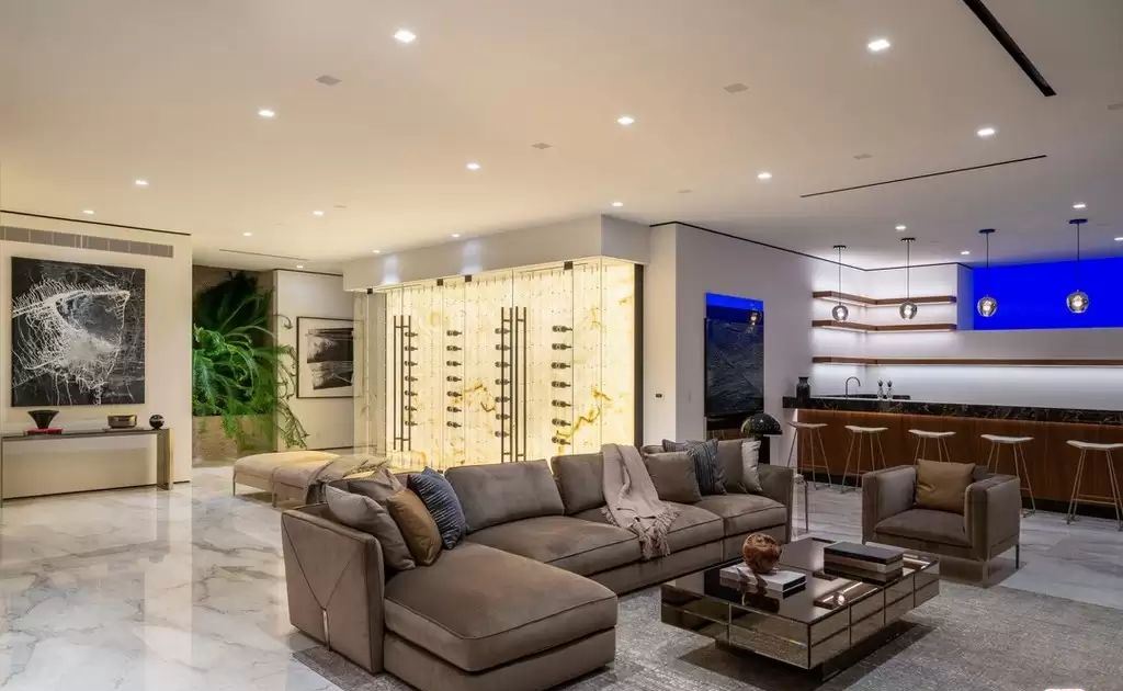 The Home in Hollywood Hills is a brand new contemporary masterpiece with unparalleled finishes and museum-quality materials now available for sale. This home located at 9410 Sierra Mar Pl, Los Angeles, California
