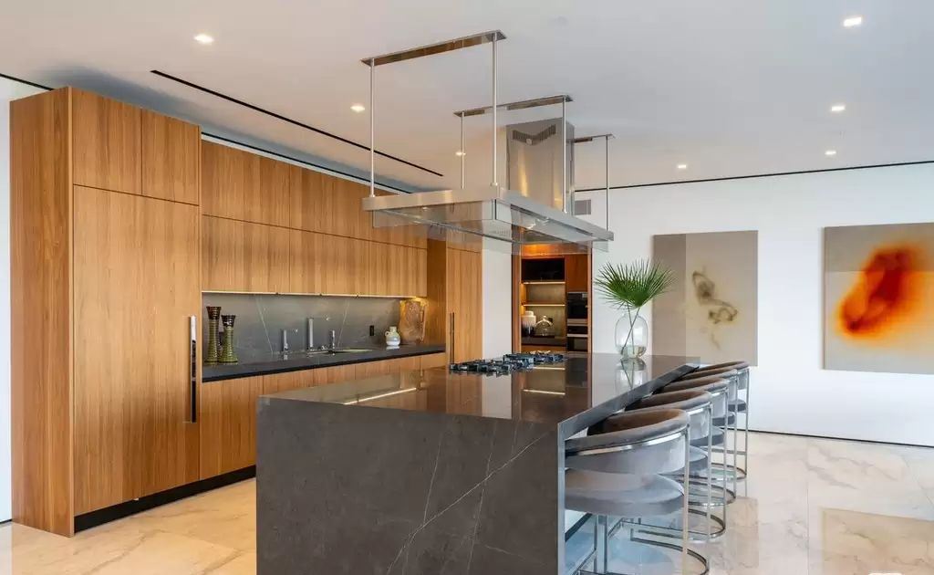 The Home in Hollywood Hills is a brand new contemporary masterpiece with unparalleled finishes and museum-quality materials now available for sale. This home located at 9410 Sierra Mar Pl, Los Angeles, California