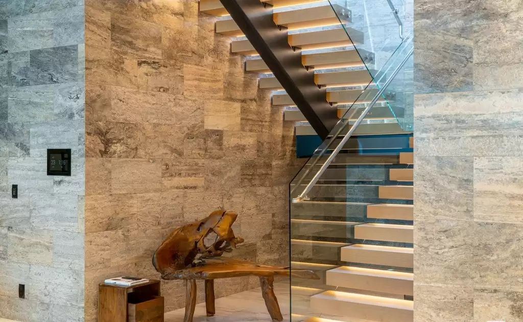 The Home in Hollywood Hills is a brand new contemporary masterpiece with unparalleled finishes and museum-quality materials now available for sale. This home located at 9410 Sierra Mar Pl, Los Angeles, California